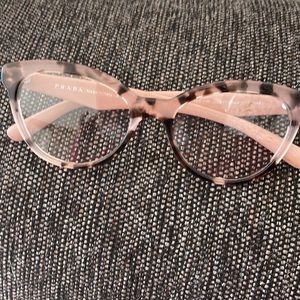 Used….. Womens Prada …. Lenses inside are plastic